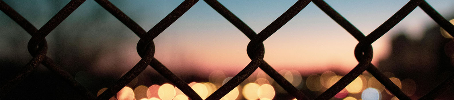 black fence with lights